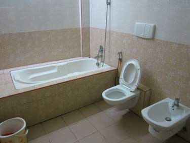 Hotel Mano Residency Rest Room Thirunallar